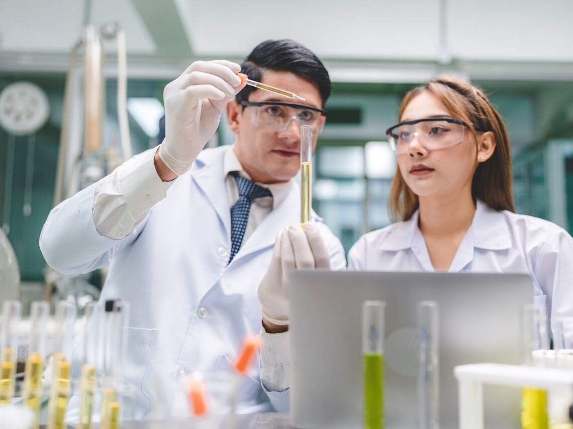 Health care researchers working in life science lab